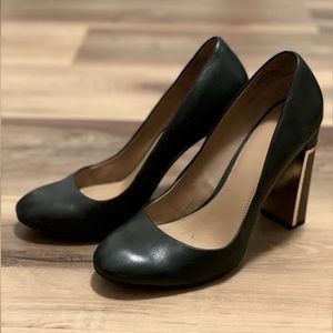 Black CK pumps with gold and wood block heel